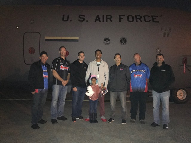 team summit memebers pose with family stationed overseas during operation appreciation