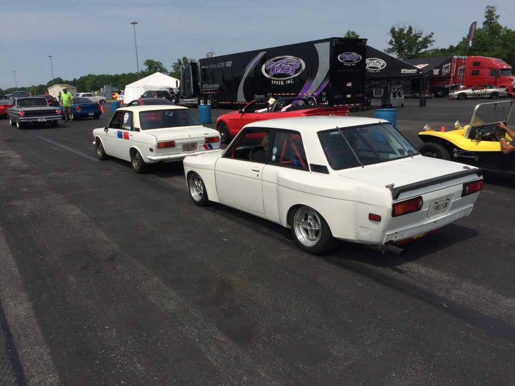 a pair of Datsun 510 autocross cars at 2018 super summit car show