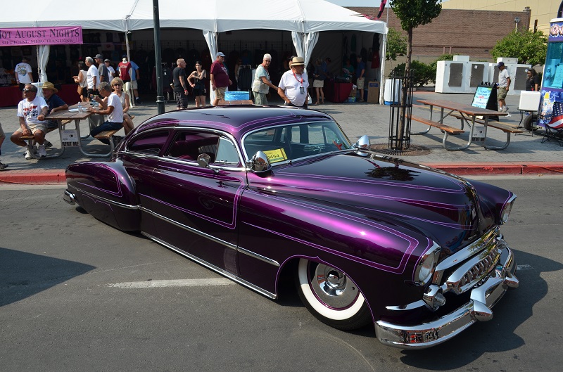 cusotm painted vintage lowrider coupe parked on street at 2018 hot august nights in reno, Nevada