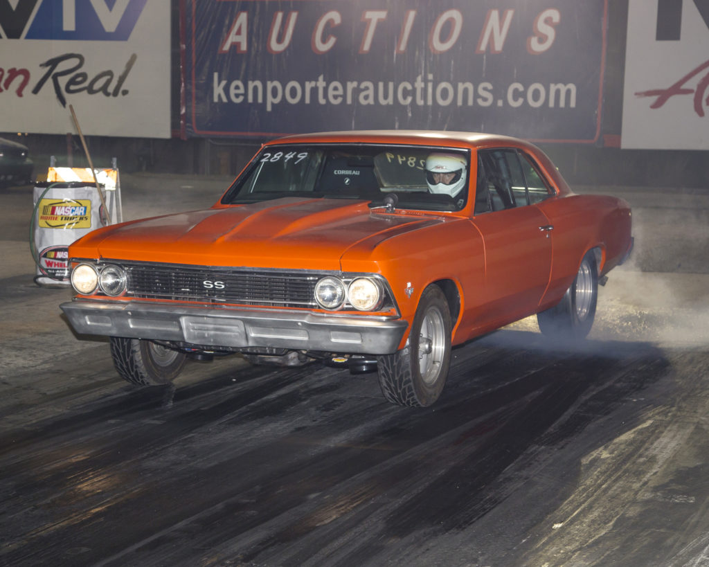man doing burnout at dragstrip in a vintage chevy chevelle