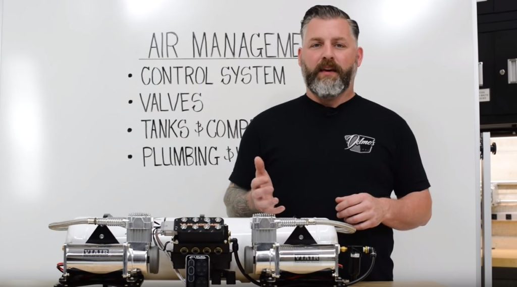 man explaining how an air suspension works
