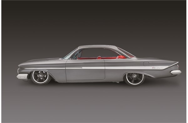 side profile of a lowered custom 1961 chevy impala