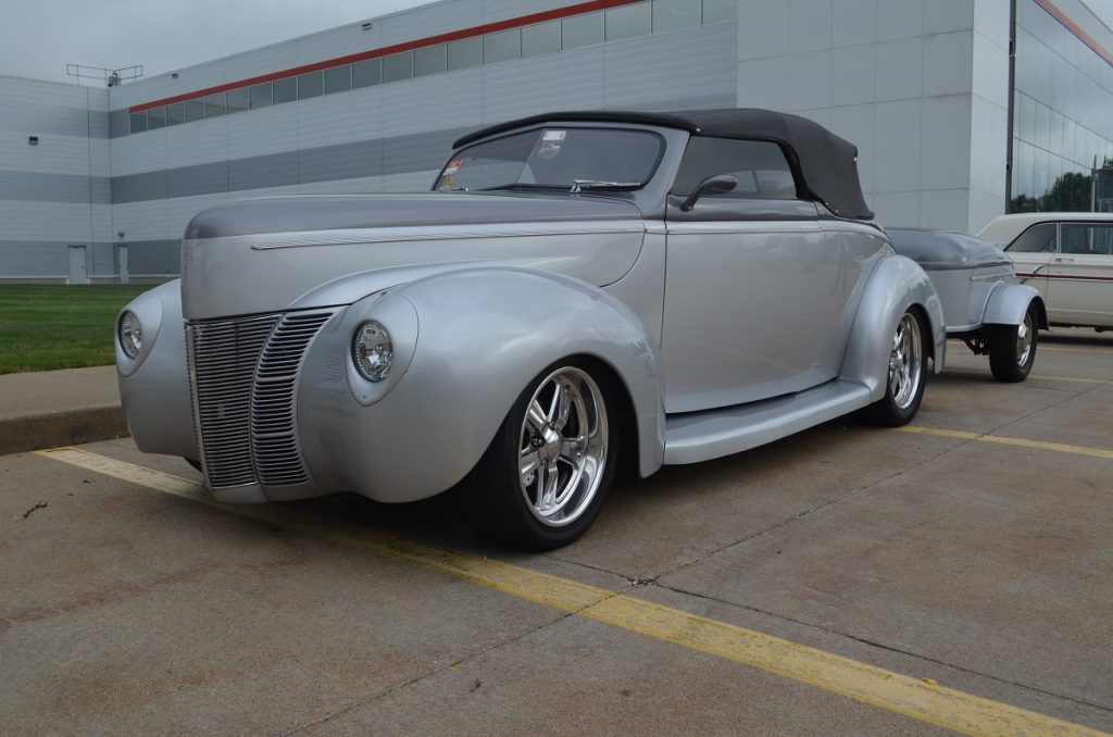front quarter shot of a 1940 custom ford de luxe hot rod convertible with trailer
