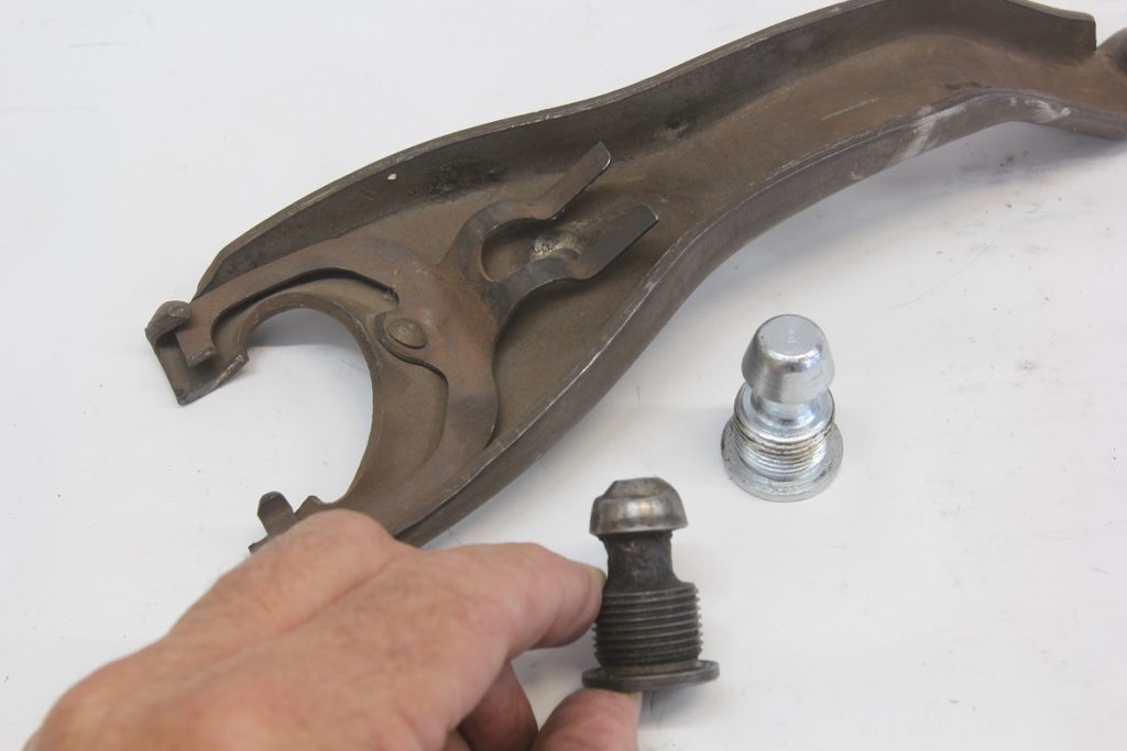 a mechanical clutch fork and bellcrank tip