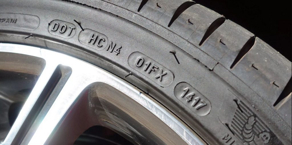 close up tire sidewall identification marks