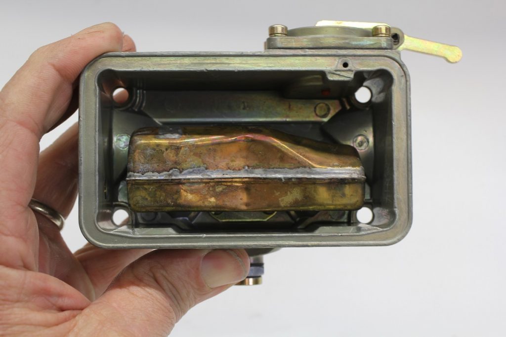 a look inside a carburetor at its fuel float