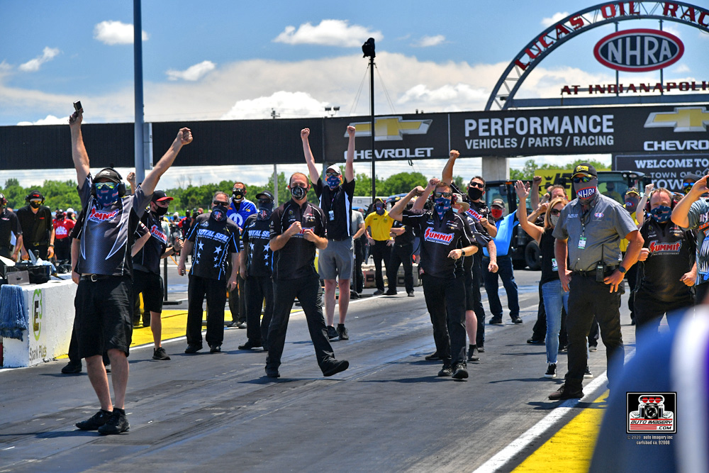 nhra team cheers at drag race starting line