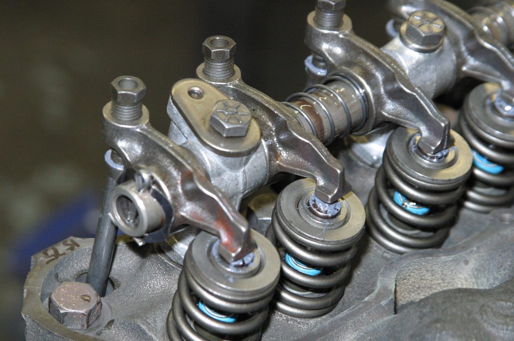 close up of rockers and valve springs on a ford inline six engine