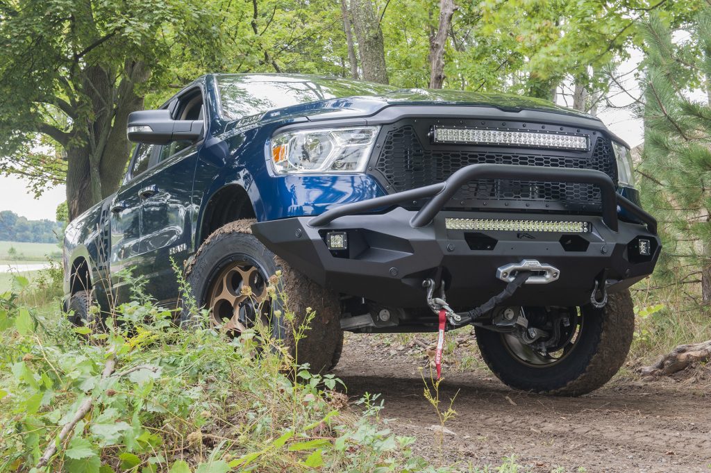 close up of front chassis and bumper for a off-road upgraded ram 1500 pickup truck