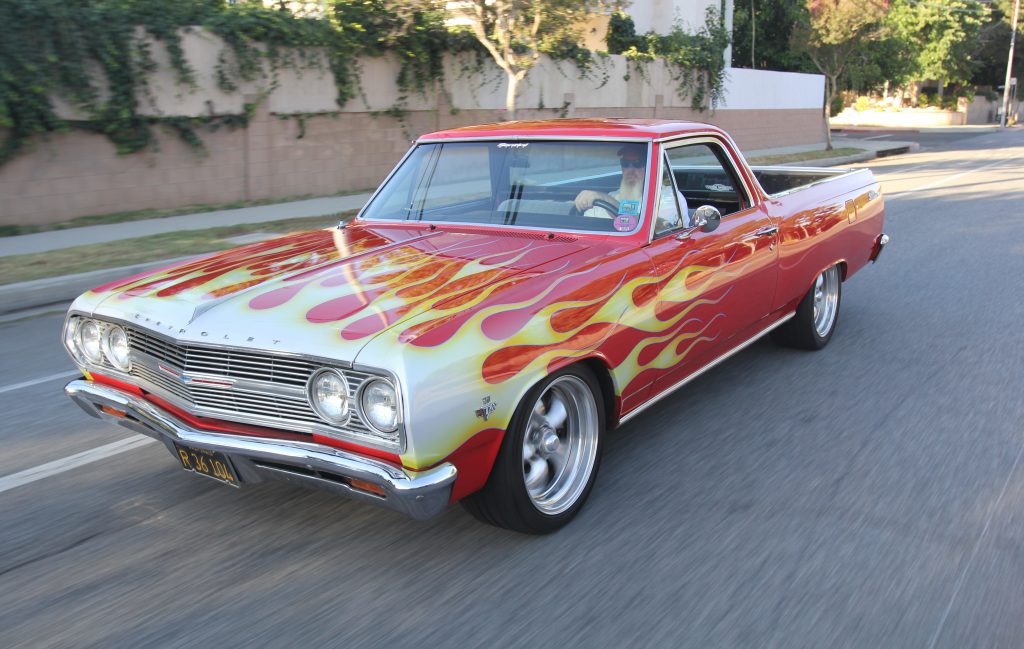 chevy el camino hot rod being driven on a street