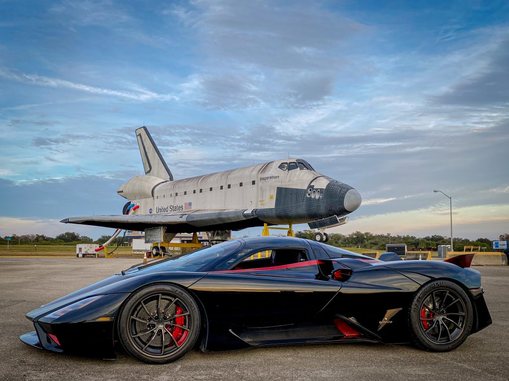 ssc tuatra supercar in front of shuttle inspiration