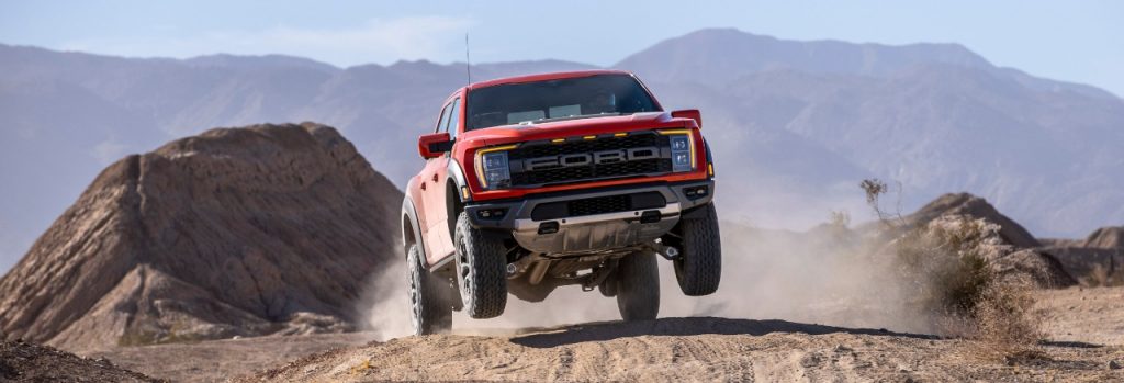 2021 ford f-150 raptor launching off small hill