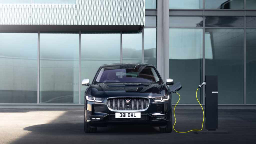 jaguar ipace electronic vehicle plugged into charging station