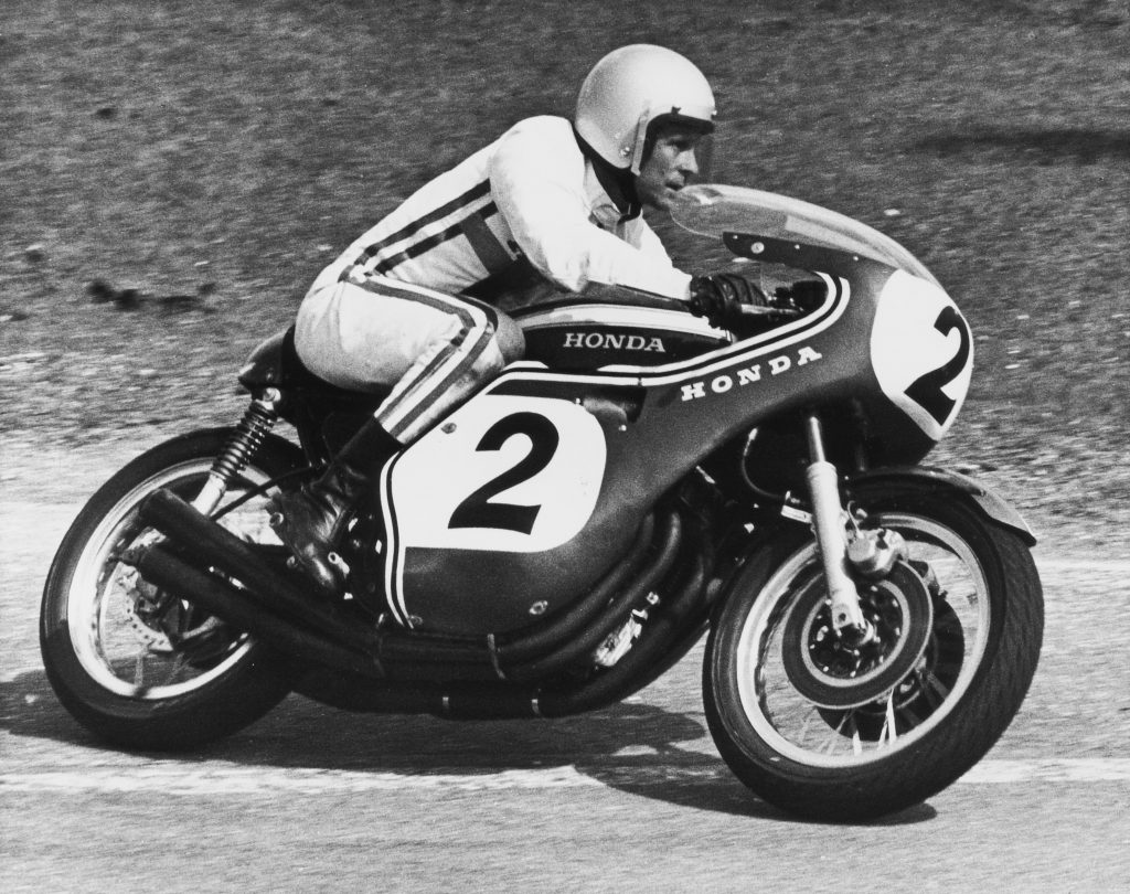 historical photo of dick mann racing on a honda motorcycle