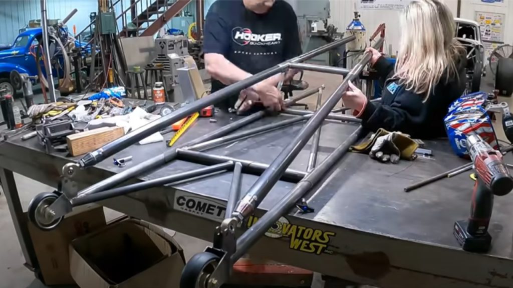 fabricators mock up wheelie bars for a dragster