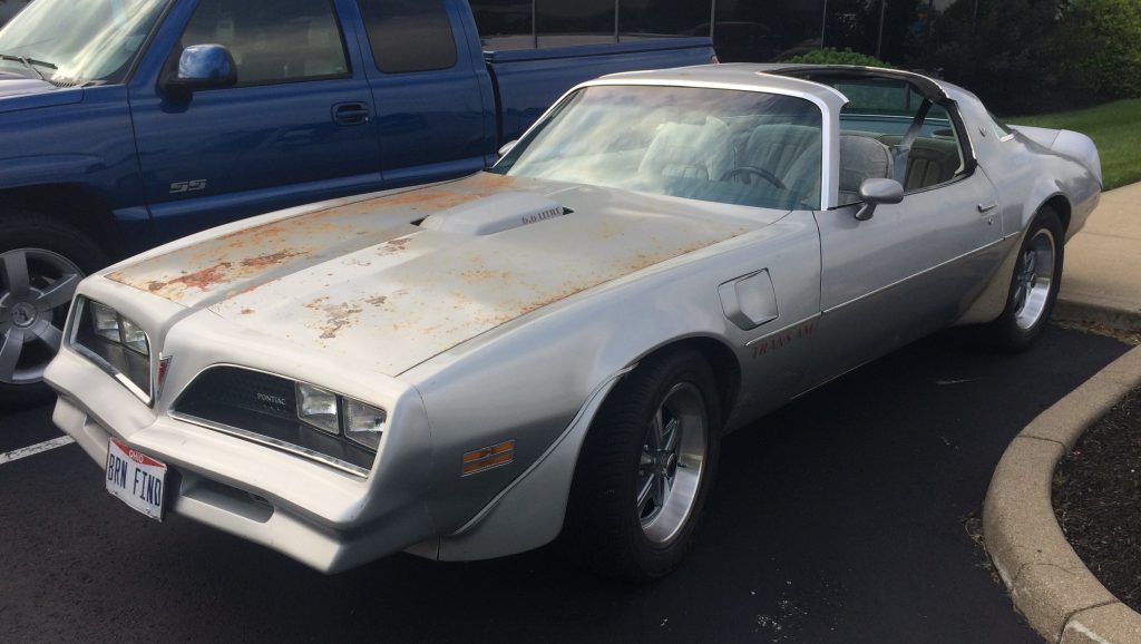 silver patina'd Pontiac trans am t-top coupe