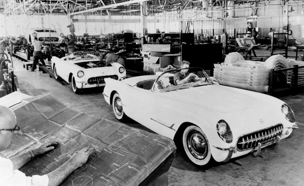 vintage photographs of corvettes on an assembly line in 1953