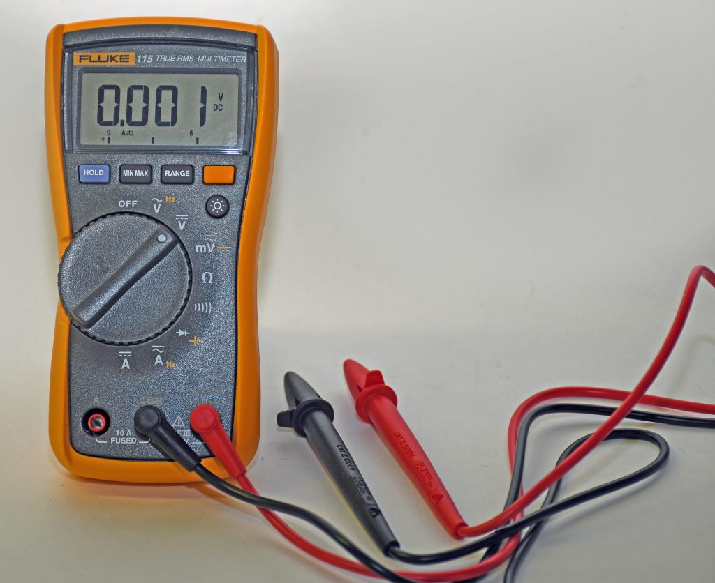 fluke electrical multimeter on a white tabletop