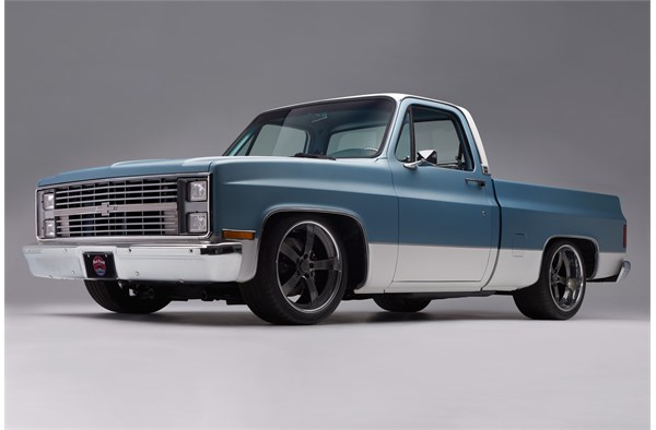 custom 1984 Chevy C-10 pickup truck with aftermarket wheels