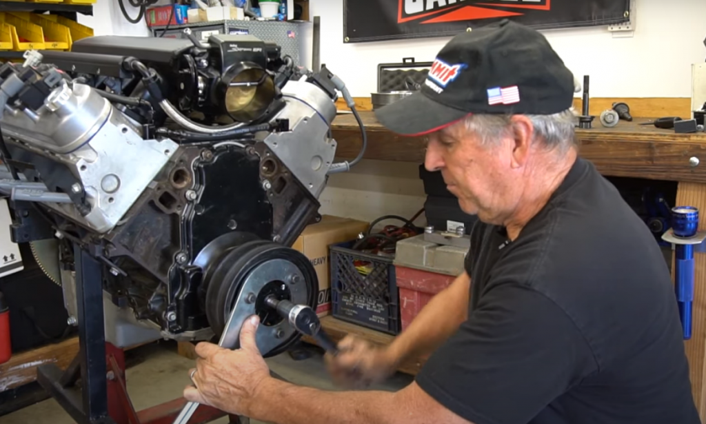 jeff smith installing a harmonic damper on a GM L engine using a summit racing tool