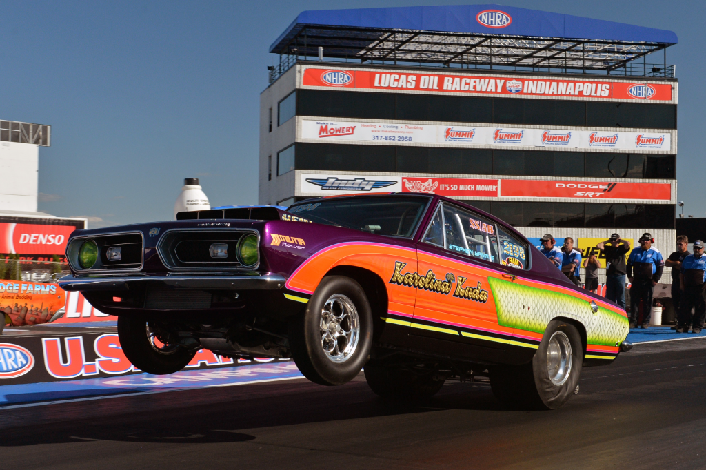 Dodge plymouth barracuda pulling a wheelstand at Indianapolis raceway park in 2021