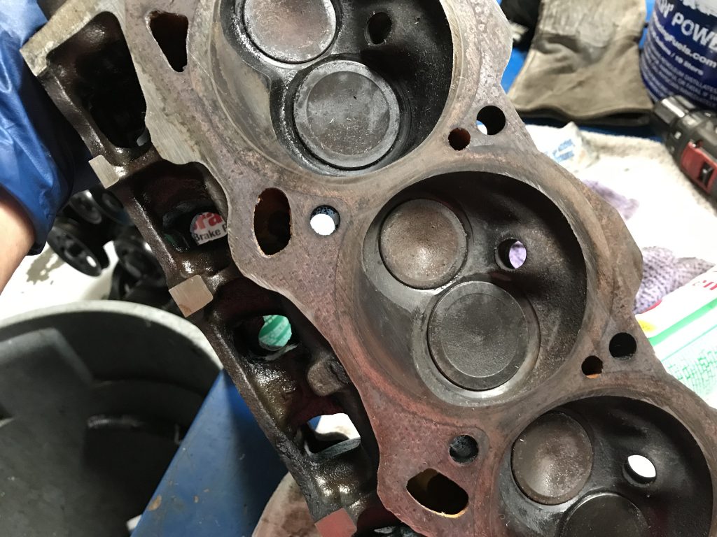 a close up look at the combustion chambers on a pontiac 3800 v6 cylinder head