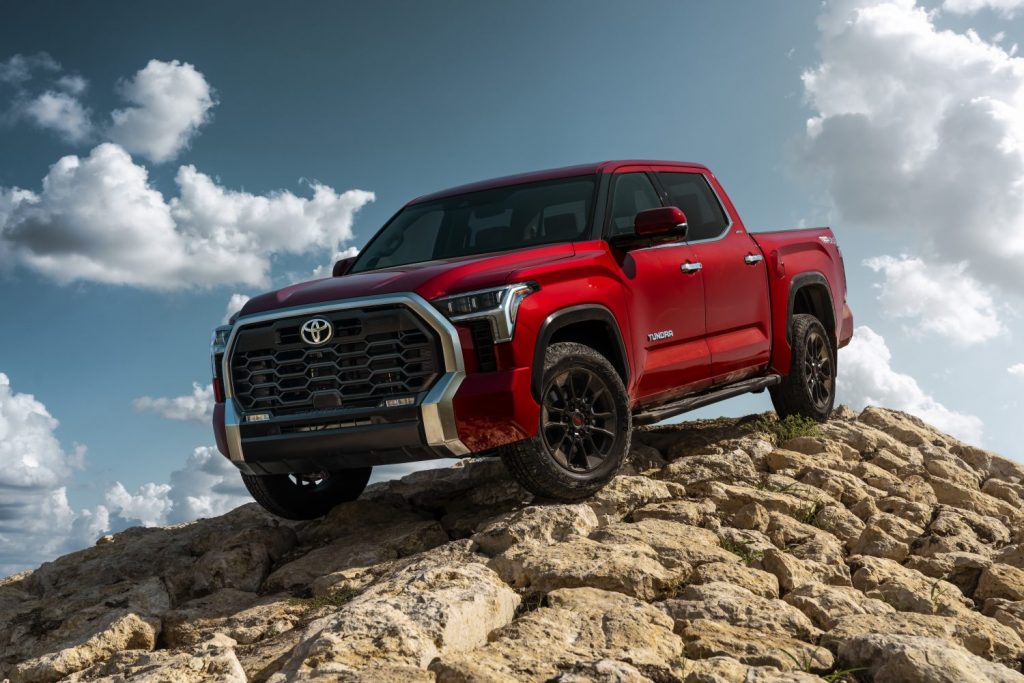 red 2022 toyota tundra climbing rocks in official press photo