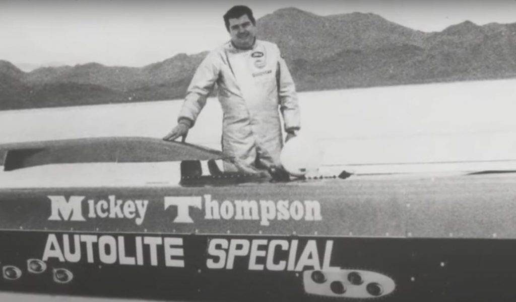 vintage black and white photo of mickey thompson at bonneville salt flats for land speed racing