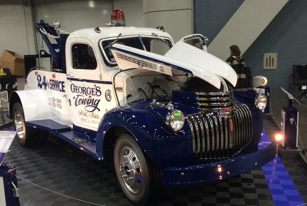 1946 chevy tow truck at indoor car show
