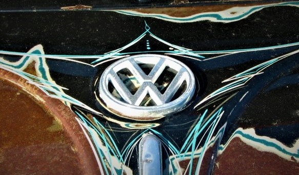 close up of volkswagen emblem on an old vw hot rod