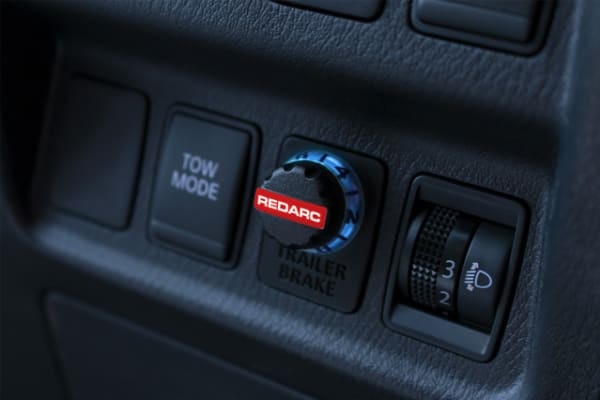 redarc tow pro brake controller adjustment knob installed in a dashboard