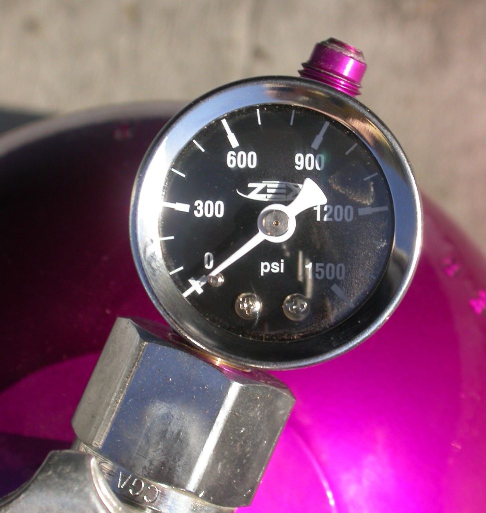 Close up of a Zex nitrous bottle pressure valve gauge indicator