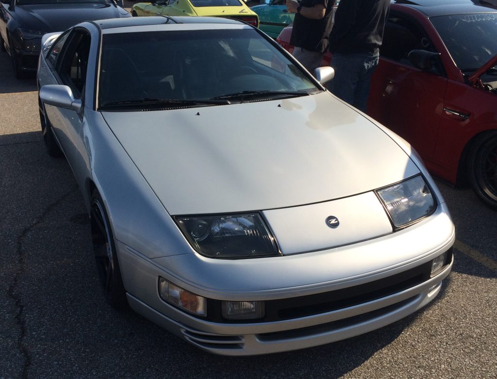 silver z32 nissan 300zx at a car show