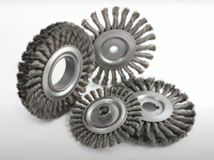collection of wire wheels on white background