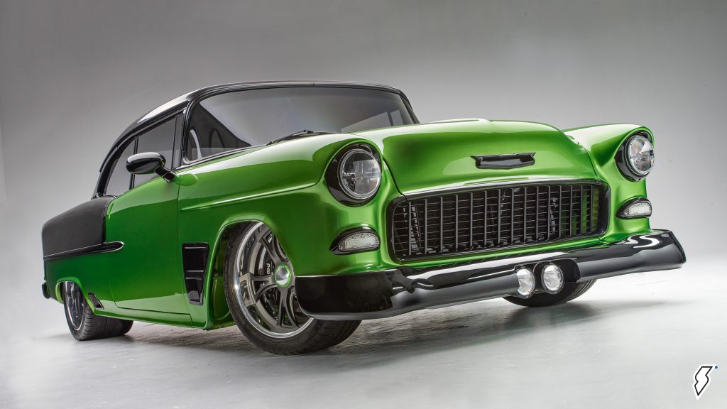 lower front quarter shot of 1955 chevy bel air that's been customized with significant modifications