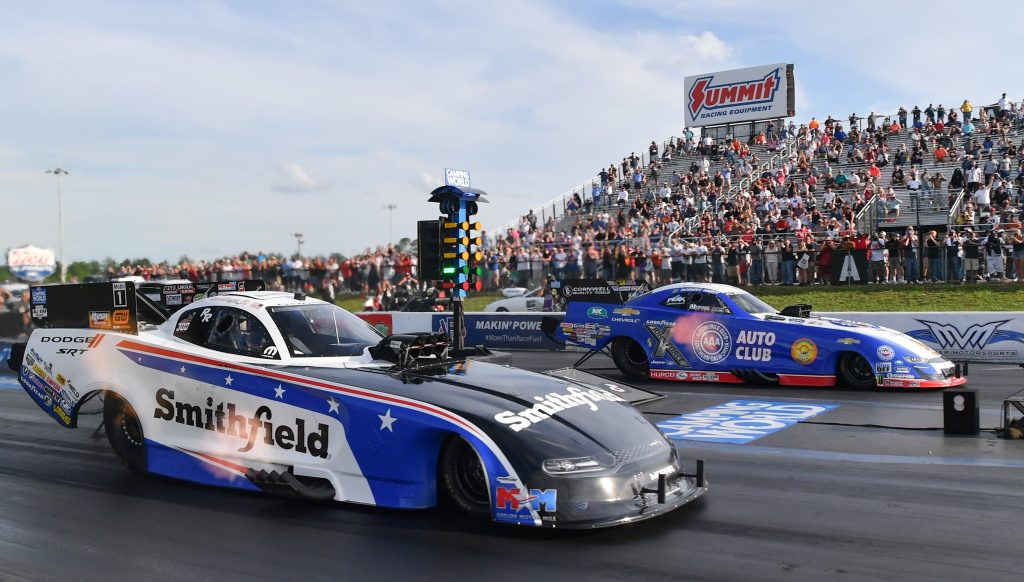 two funny cars prepare to launch at 2022 Virginia nhra nationals drag race