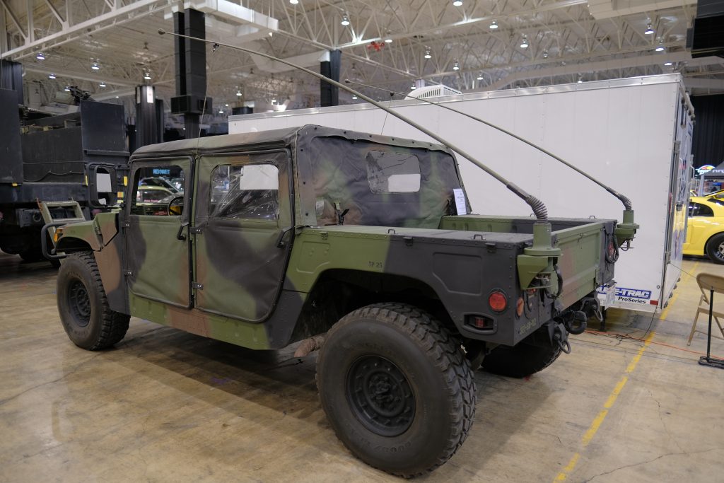 side view of antenna whips on a military humvee