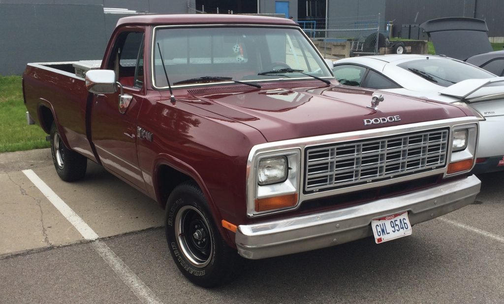 dodge ram d150 classic pickup truck at a vintage car show