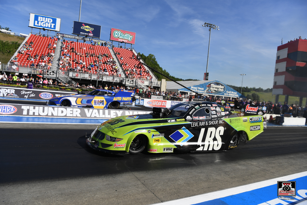 tim wilkerson in the finals of the funny car at 2022 nhra thunder valley nationals