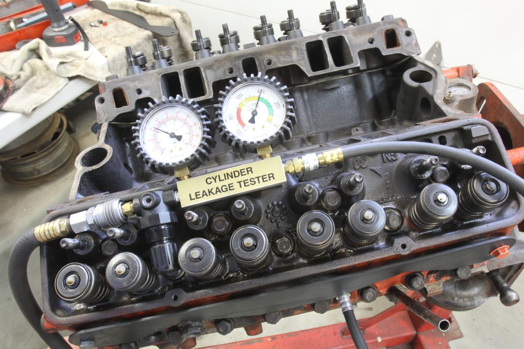 a v8 engine during a cylinder leakage leakdown test