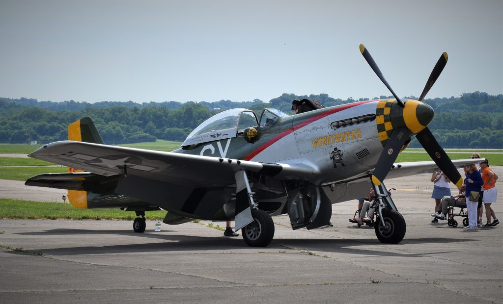 p-51d mustang military aircraft called the gunfighter on displace at vintage military vehicle show in Cincinnati ohio