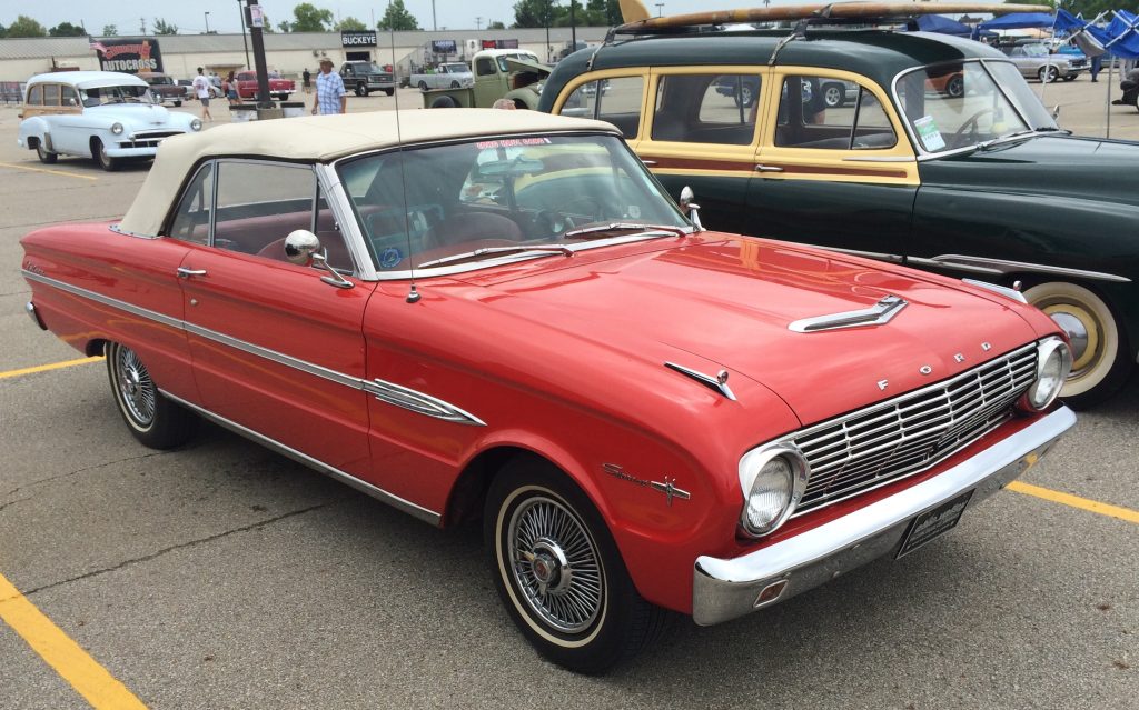 Red Ford Falcon convertible sprint at a car show