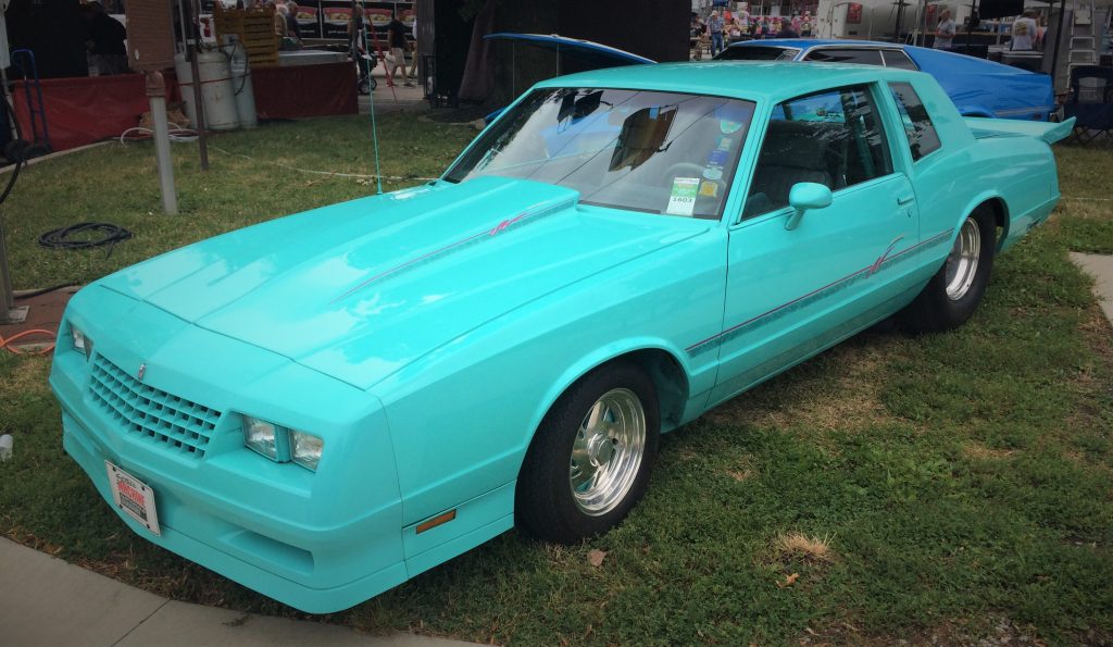 a light blue monte carlo ss from the mid-1980s modified in a pro street custom style