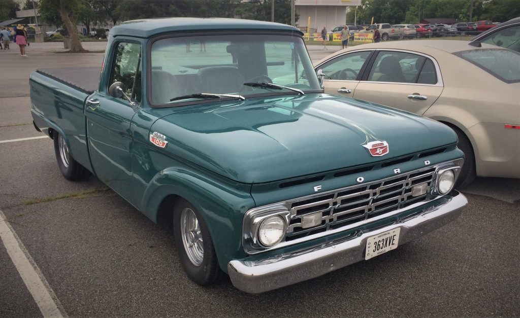 classic ford f-100 pickup truck at a classic car show