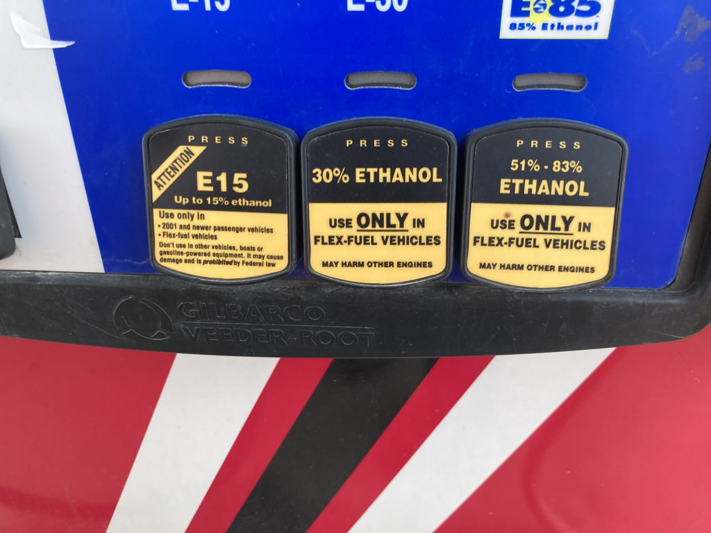 view of ethanol blended gasoline pumps at gas station
