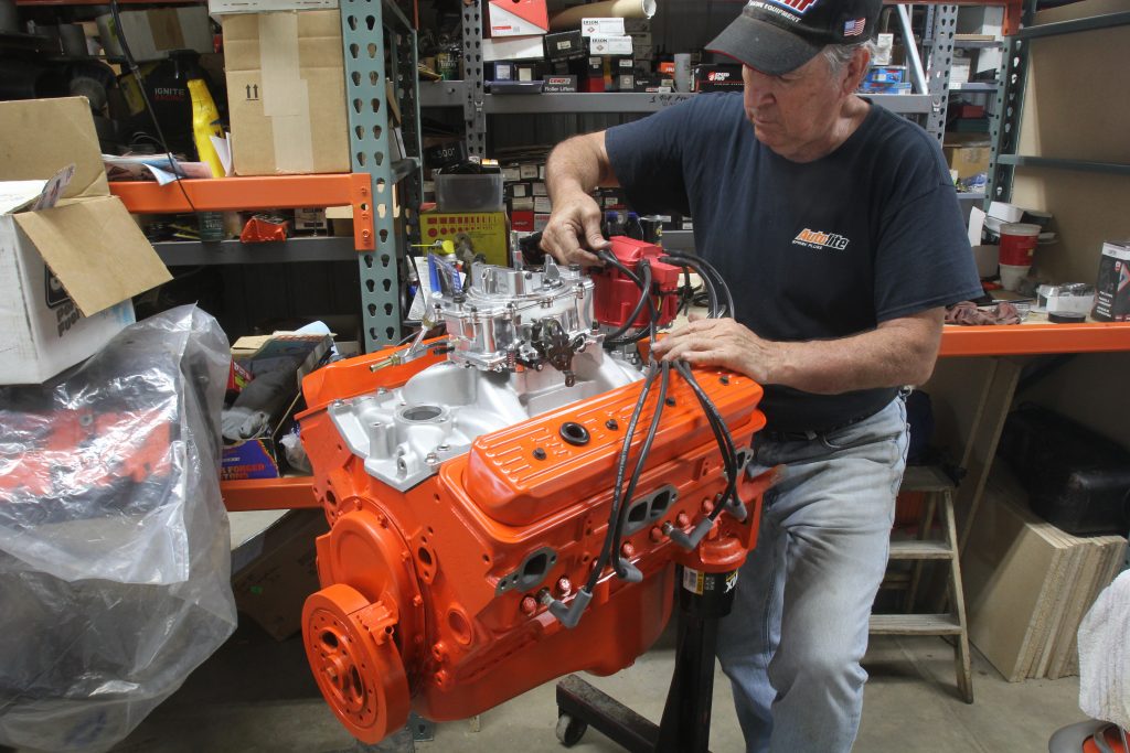 jeff smith performns final assembly on a 355 cubic inch small block chevy engine on an engine stand