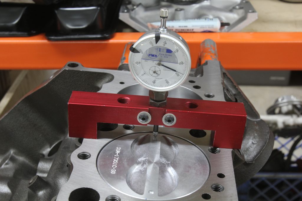 measuring piston travel with a dial gauge on a small block chevy v8 engine