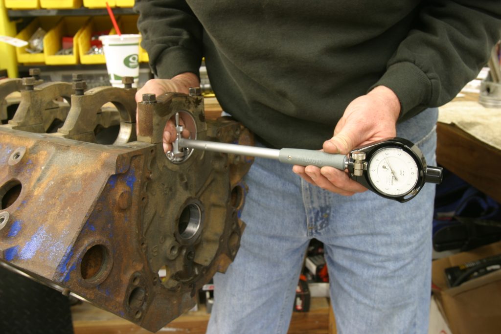 measuring main clearance on a v8 engine with a dial bore gauge