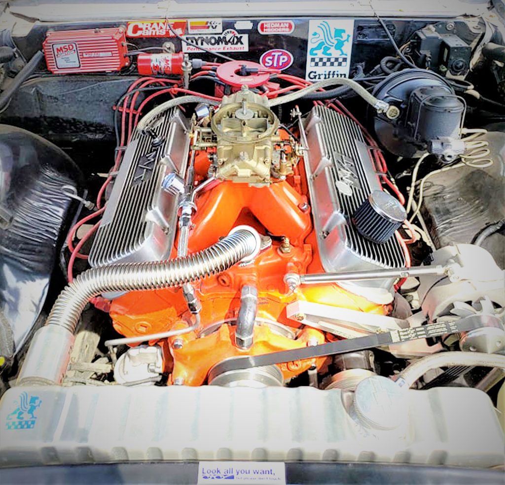 modified big block chevy v8 engine under the hood of a chevelle