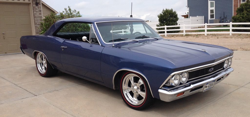 first gen chevy chevelle with custom wheels and diamond back tires